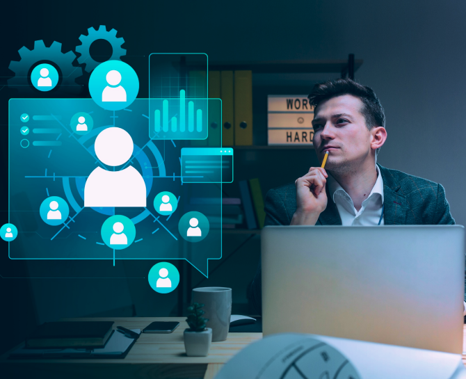 A person sits at a desk with a laptop, surrounded by digital graphics representing data, analytics, and network connections.