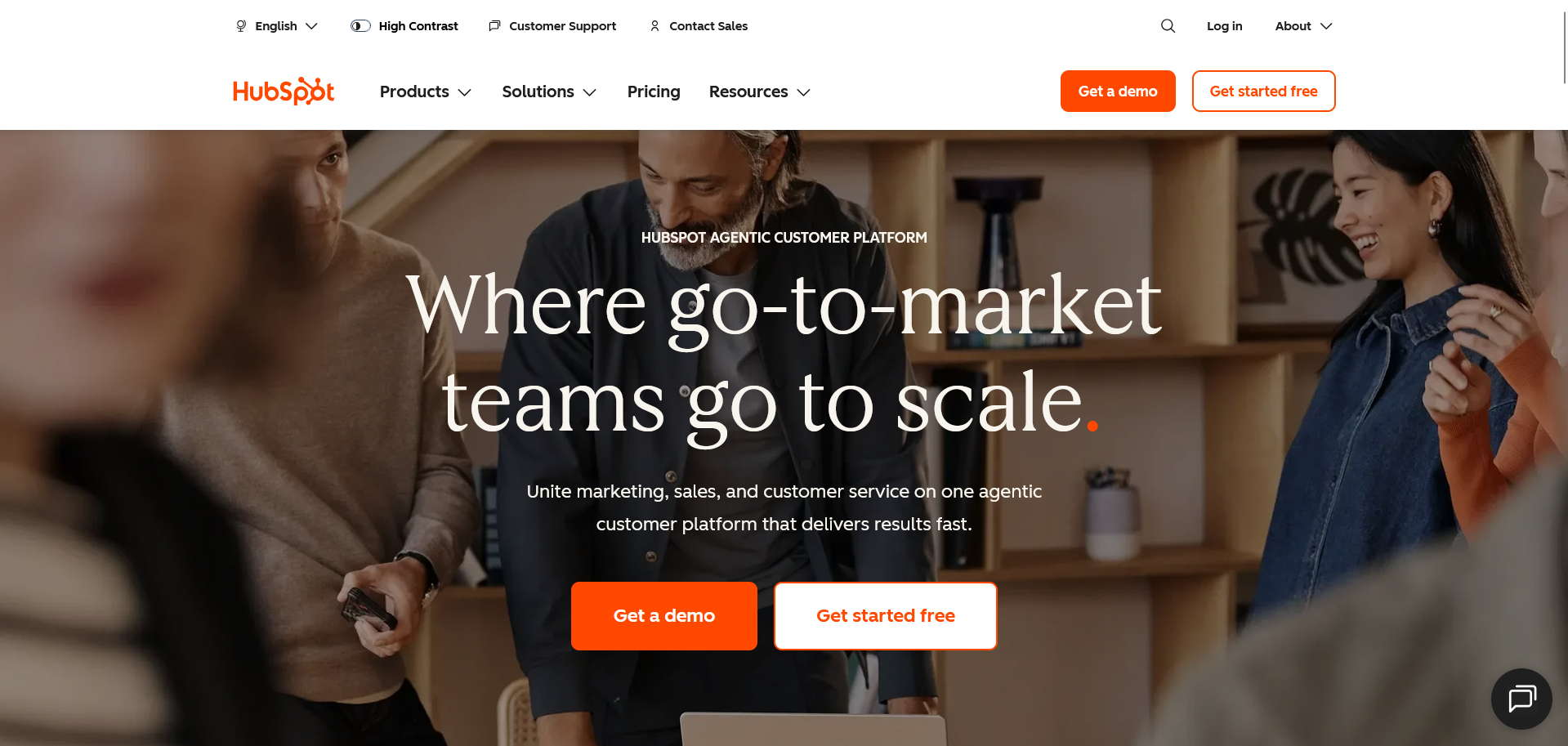 HubSpot homepage showing go-to-market teams collaborating with buttons for "Get a demo" and "Get started free."